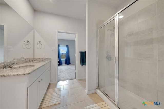 390 Lost Maples, New Braunfels, TX 78130 - bathroom featuring double vanity, a stall shower, and tile patterned flooring