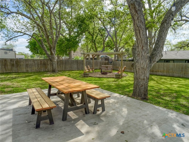 view of patio featuring a pergola, a fenced backyard, and outdoor dining area