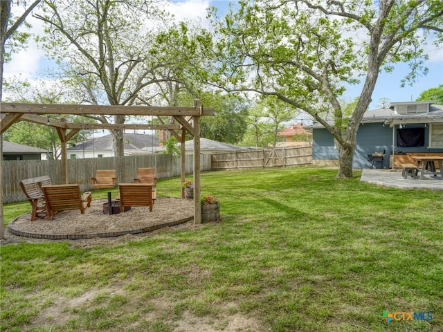 view of yard with a fenced backyard and a patio area