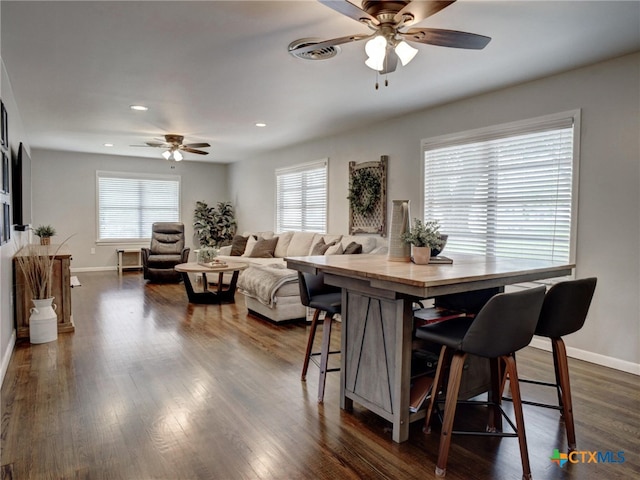 dining area featuring recessed lighting, dark wood-style flooring, baseboards, and ceiling fan