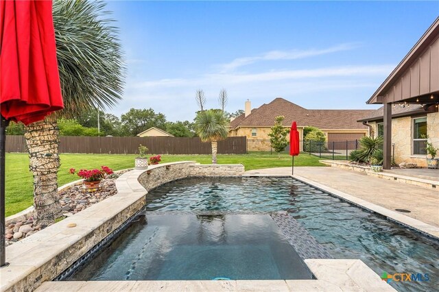 view of pool with a yard, a fenced in pool, and a fenced backyard