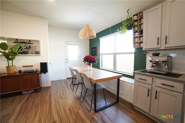 dining area with dark wood finished floors