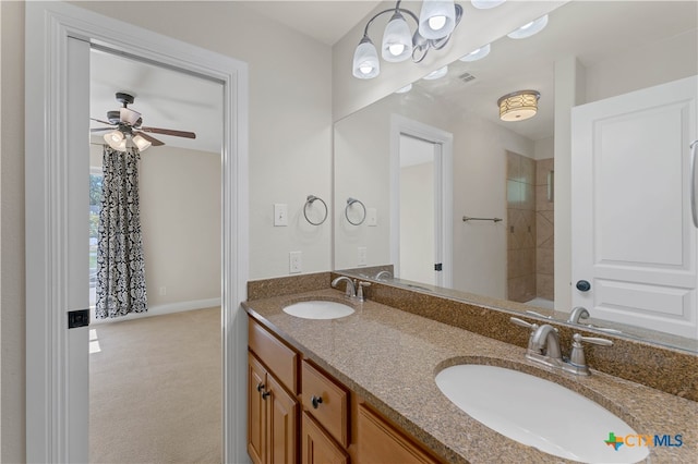 bathroom featuring vanity and ceiling fan