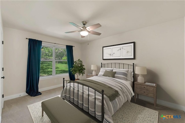 781 Meridian Dr, New Braunfels, TX 78132 - bedroom featuring baseboards, light carpet, and ceiling fan