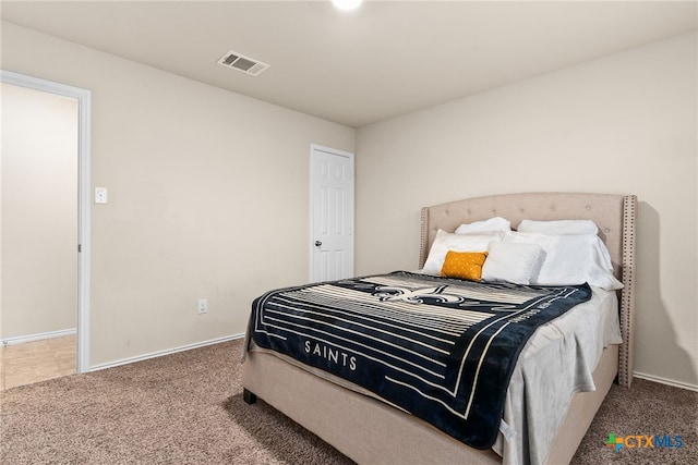 bedroom featuring carpet