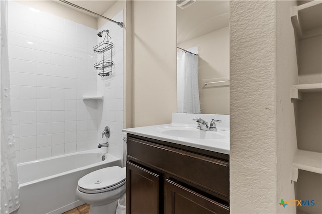 full bathroom featuring shower / bath combo, vanity, and toilet