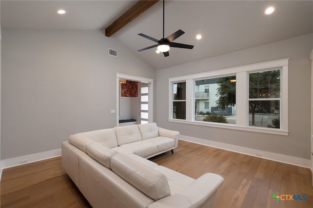 645 Center Grn, New Braunfels, TX 78130 - living area featuring visible vents, wood finished floors, baseboards, vaulted ceiling with beams, and a ceiling fan