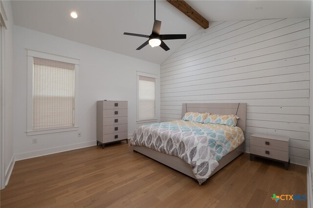 645 Center Grn, New Braunfels, TX 78130 - bedroom featuring recessed lighting, lofted ceiling with beams, multiple windows, and wood finished floors