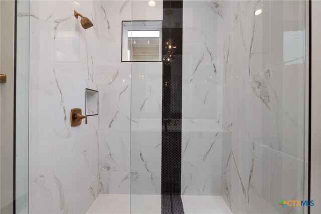 645 Center Grn, New Braunfels, TX 78130 - full bathroom featuring a marble finish shower