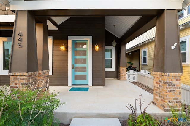645 Center Grn, New Braunfels, TX 78130 - doorway to property with covered porch
