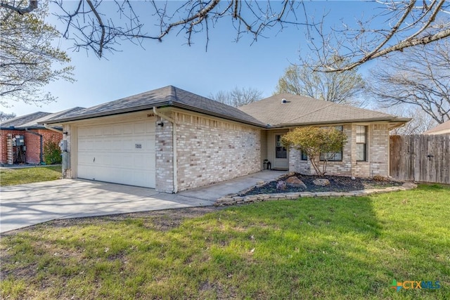 ranch-style house with fence, concrete driveway, a front yard, an attached garage, and brick siding