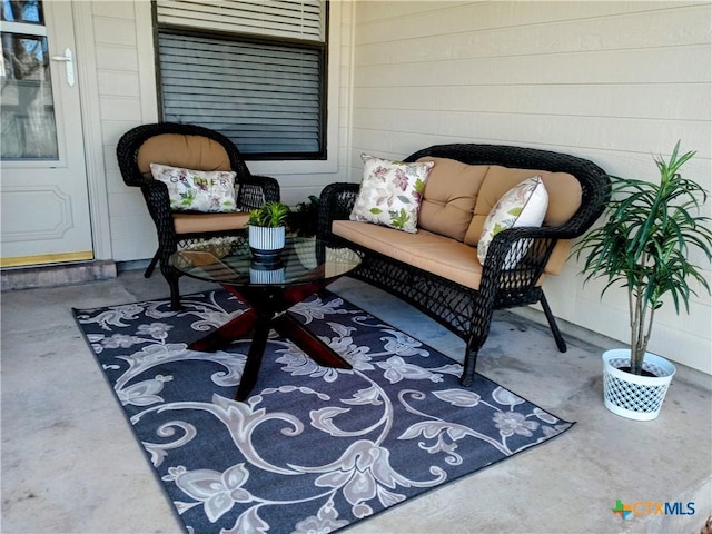 exterior space featuring an outdoor hangout area