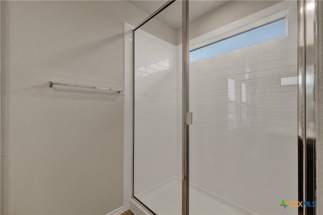 bathroom with walk in shower