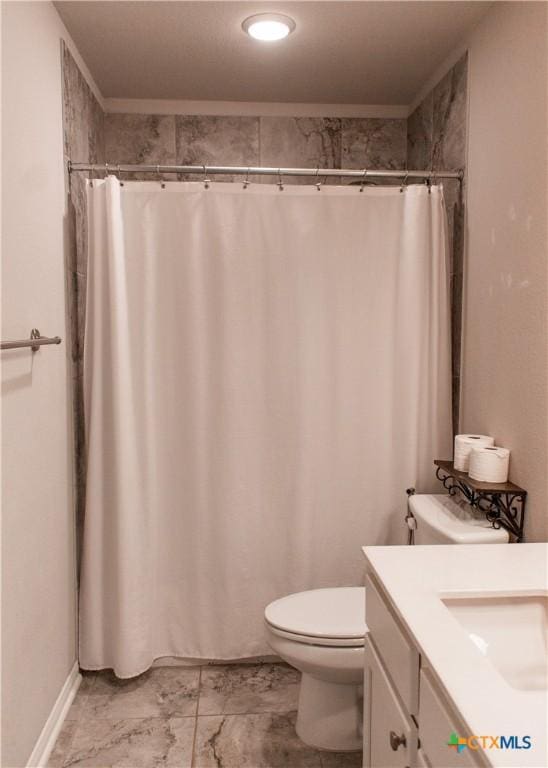 full bath with toilet, vanity, marble finish floor, and a shower with curtain