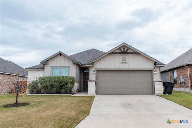 ranch-style house with concrete driveway, roof with shingles, a front lawn, and an attached garage