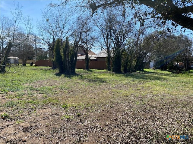 view of yard featuring fence