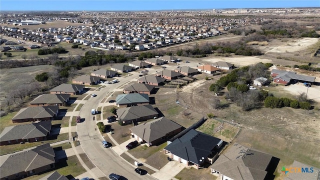 drone / aerial view with a residential view