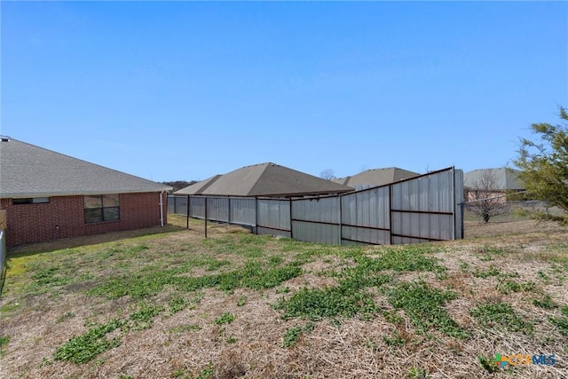 view of yard featuring fence