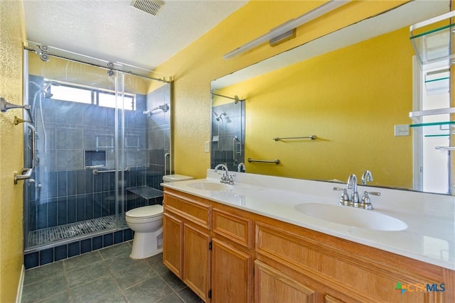 full bathroom with a stall shower, toilet, visible vents, and a sink