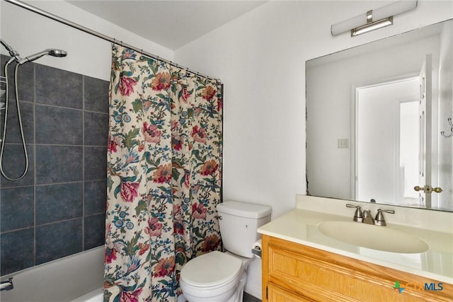 full bathroom with toilet, vanity, and shower / bath combination with curtain