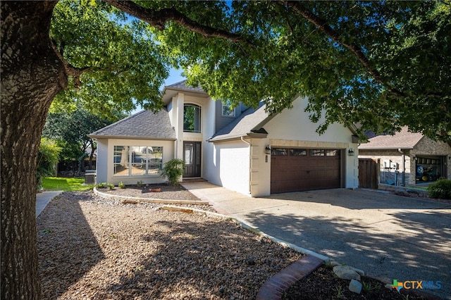 view of front of property with a garage