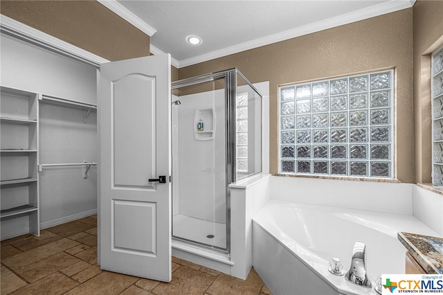 bathroom with crown molding, plus walk in shower, and a textured ceiling