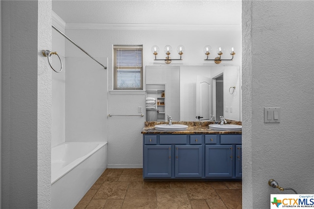 bathroom with shower / bathing tub combination, vanity, and crown molding