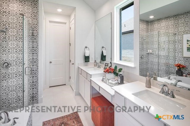 full bathroom with tiled shower, vanity, tile patterned floors, a tub to relax in, and recessed lighting