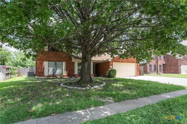 707 Bond St, Copperas Cove, TX 76522 - obstructed view of property featuring brick siding, driveway, and a garage