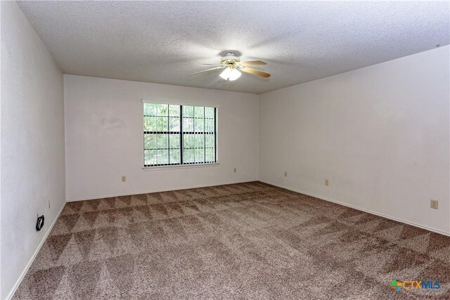 707 Bond St, Copperas Cove, TX 76522 - empty room featuring carpet floors, a ceiling fan, and a textured ceiling