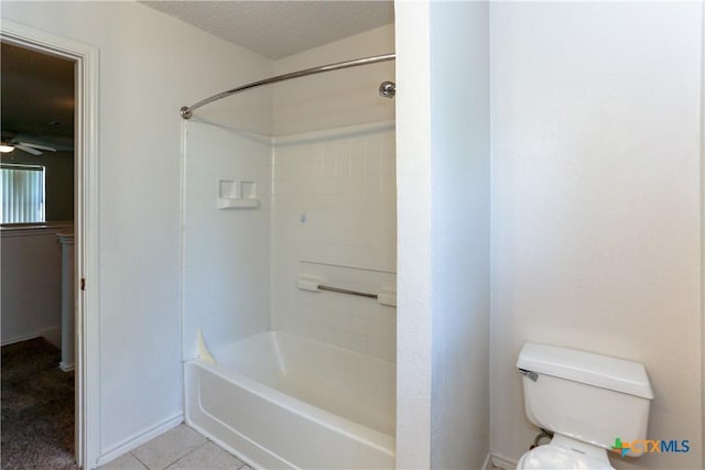 707 Bond St, Copperas Cove, TX 76522 - full bath featuring bathing tub / shower combination, tile patterned flooring, a textured ceiling, and ceiling fan