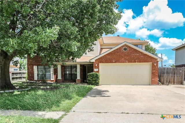 707 Bond St, Copperas Cove, TX 76522 - view of front facade featuring brick siding, driveway, and an attached garage