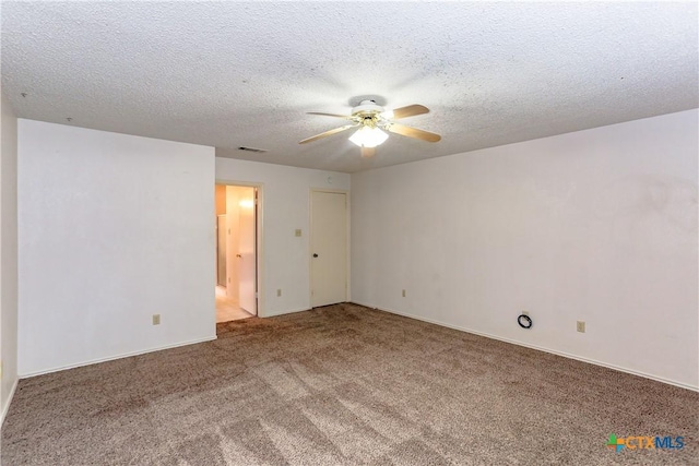 707 Bond St, Copperas Cove, TX 76522 - spare room with a ceiling fan, carpet, and a textured ceiling