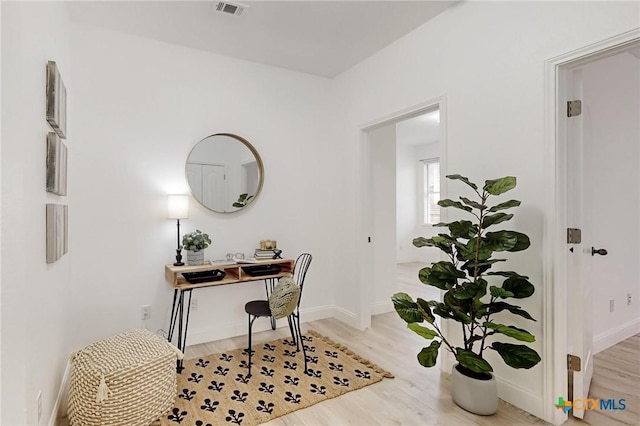 office space featuring light hardwood / wood-style floors