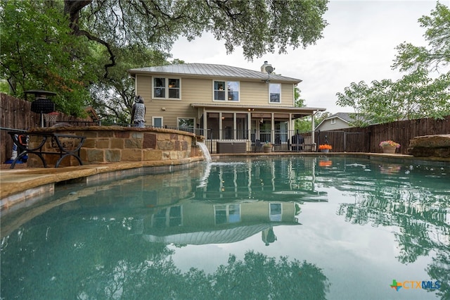 404 N Austin St, Buda, TX 78610 - view of swimming pool with a sunroom