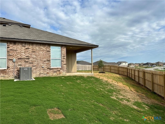 3005 Hedwig St, Killeen, TX 76549 - rear view of house featuring brick siding, cooling unit, and a shingled roof