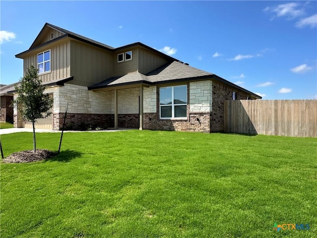 3005 Hedwig St, Killeen, TX 76549 - view of front of house featuring board and batten siding, brick siding, and concrete driveway