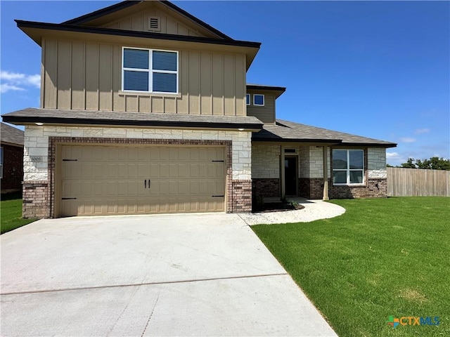 3005 Hedwig St, Killeen, TX 76549 - view of front of house featuring a garage, board and batten siding, concrete driveway, and stone siding