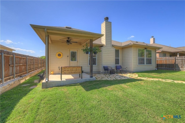 6333 Iris Run, New Braunfels, TX 78132 - back of house with ceiling fan, a patio, a fenced backyard, and a chimney