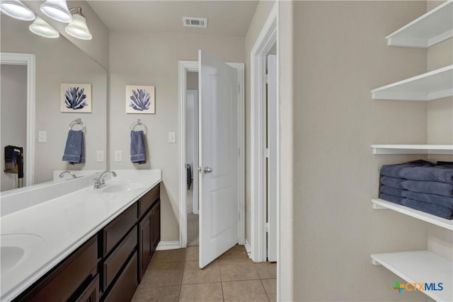 6333 Iris Run, New Braunfels, TX 78132 - bathroom with double vanity and tile patterned floors