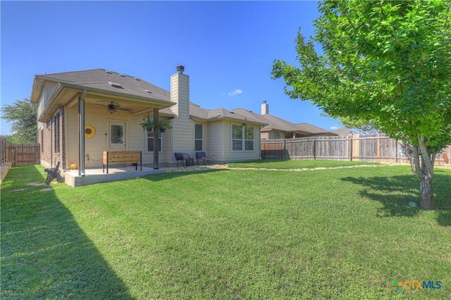 6333 Iris Run, New Braunfels, TX 78132 - rear view of house with a patio, a ceiling fan, a fenced backyard, and a chimney