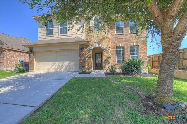 6333 Iris Run, New Braunfels, TX 78132 - traditional-style house featuring an attached garage, stone siding, and concrete driveway