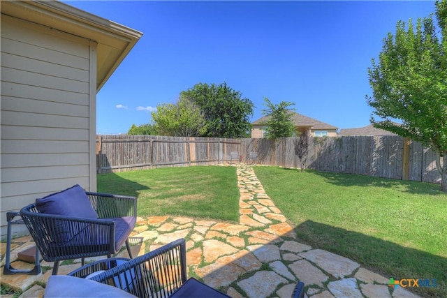 6333 Iris Run, New Braunfels, TX 78132 - fenced backyard featuring a patio