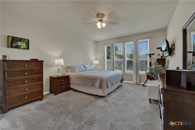 6333 Iris Run, New Braunfels, TX 78132 - bedroom featuring light colored carpet and a ceiling fan