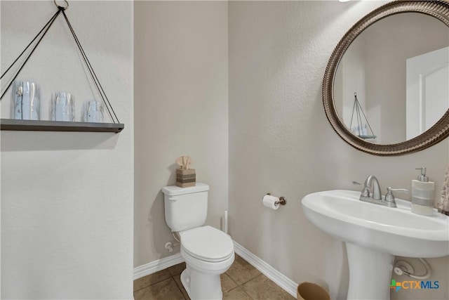 6333 Iris Run, New Braunfels, TX 78132 - half bathroom with tile patterned floors and toilet
