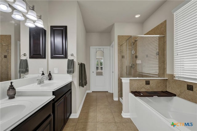 6333 Iris Run, New Braunfels, TX 78132 - bathroom with a stall shower, vanity, a garden tub, and tile patterned floors