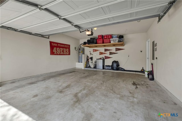 6333 Iris Run, New Braunfels, TX 78132 - garage with a garage door opener and strapped water heater