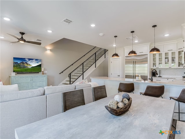 dining room with ceiling fan