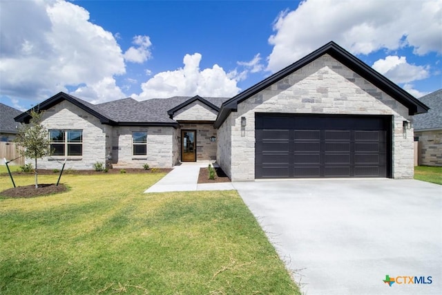 122 Overlook Trl, Copperas Cove, TX 76522 - french country inspired facade with stone siding, driveway, and an attached garage