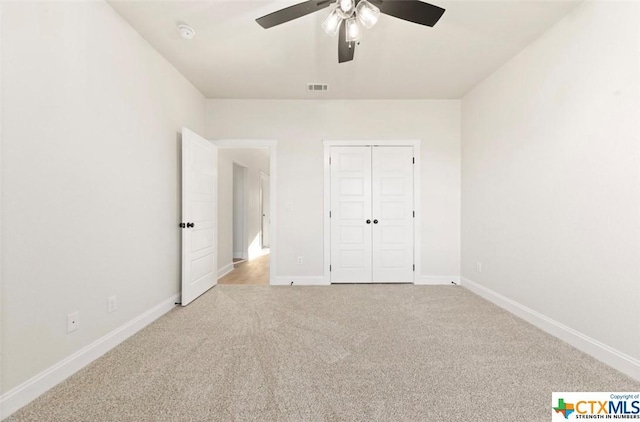 122 Overlook Trl, Copperas Cove, TX 76522 - unfurnished bedroom featuring carpet flooring, baseboards, a ceiling fan, and a closet
